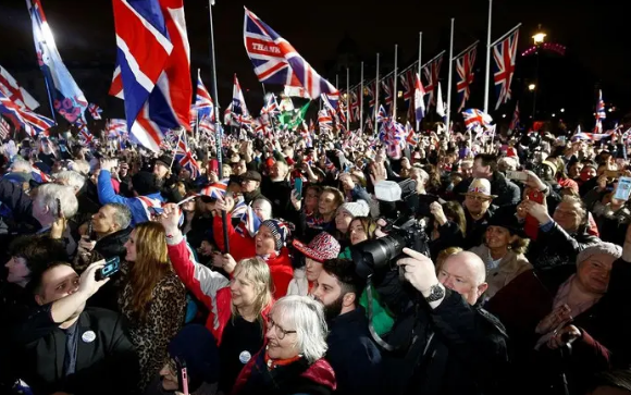 Flag-waving Britons stage noisy Brexit welcome outside parliament