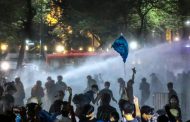 Thai police use water cannon to stop pro-democracy march to palace